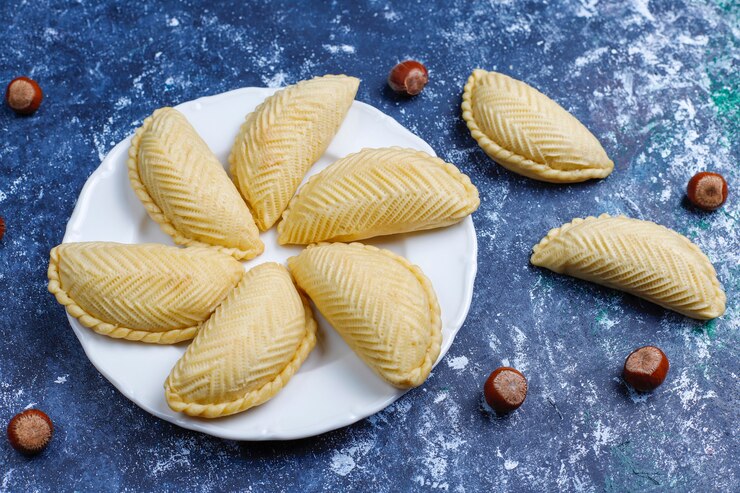 azerbaijan-national-pastry-shakarbura-white-plate-top-view-spring-new-year-celebration-novruz-holiday_114579-7406 azerbaijan-national-pastry-shakarbura-white-plate-top-view-spring-new-year-celebration-novruz-holiday_114579-7406